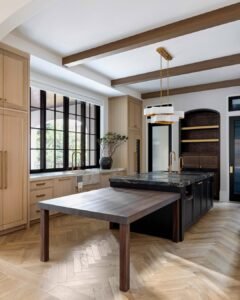 closed kitchen with fluted glass doors and steel fram window