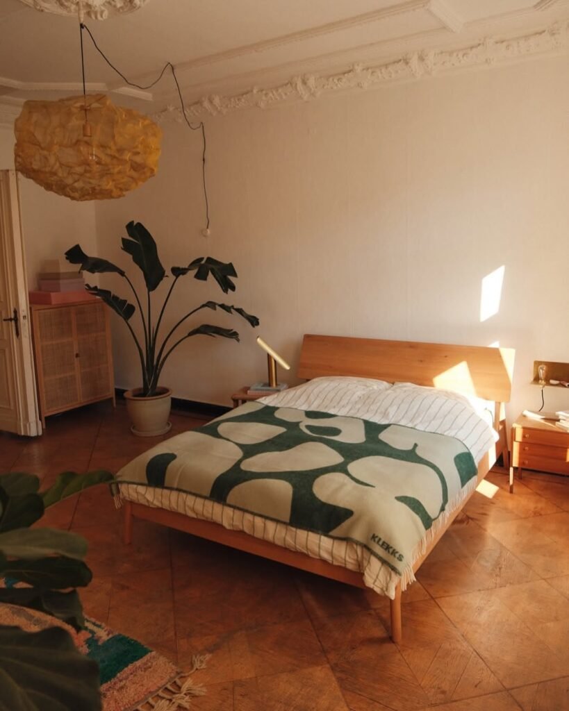 cozy elegent boho style bedroom with tree decoration