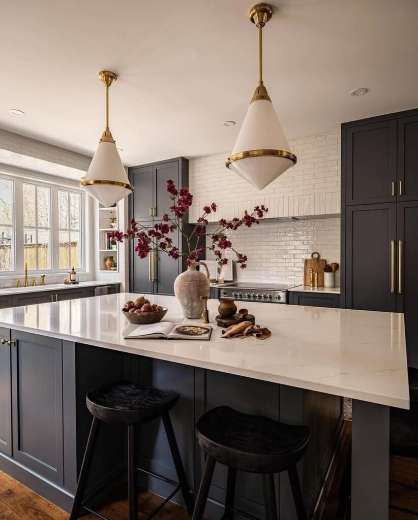 kitchen with dark cabinets and white stome and tiles