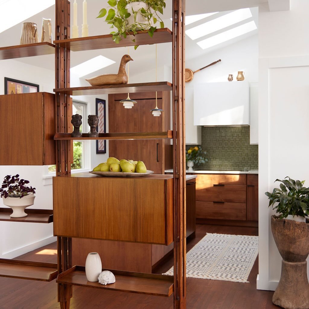 kitchen with decorated wood shelves divider